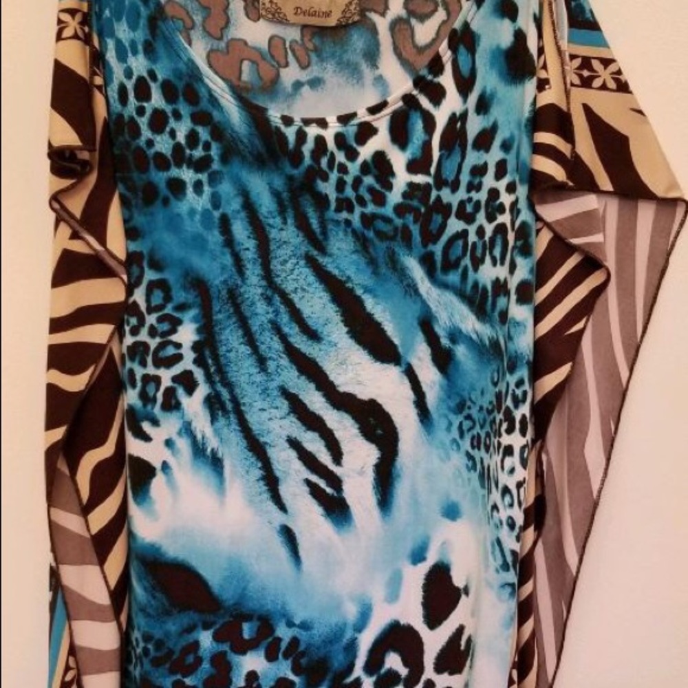 Animal print sleeveless top with wings.